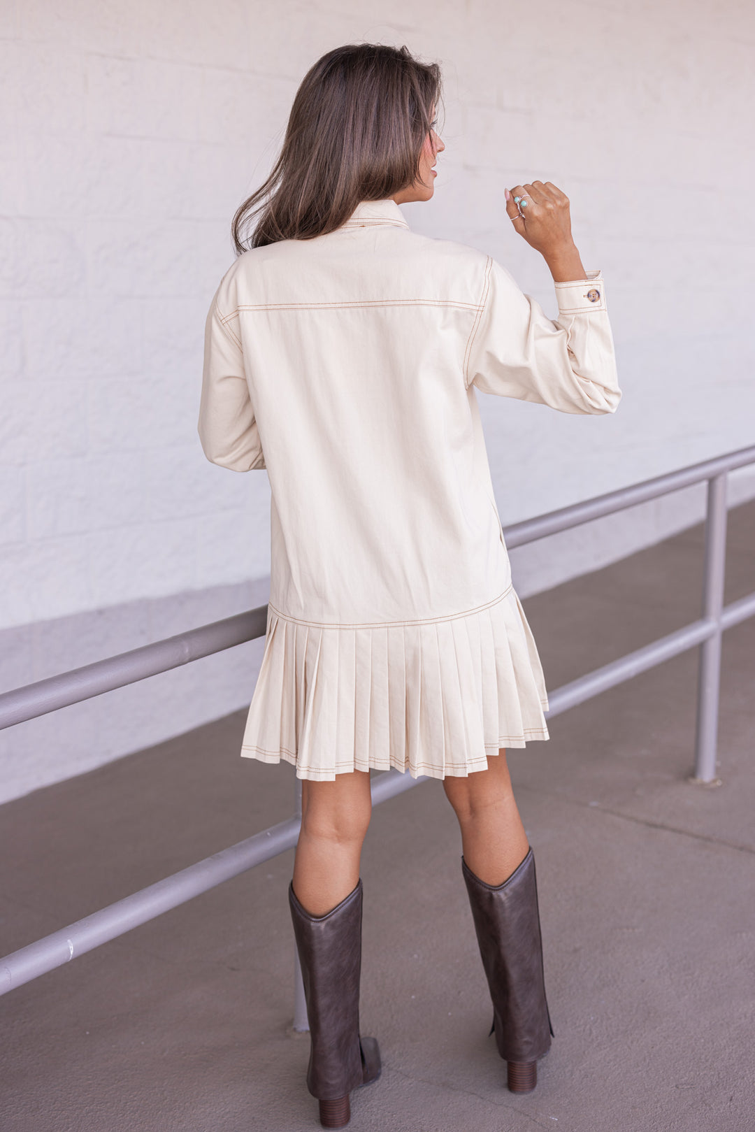 Women's ecru denim twill button front dress with brown stitching trim by Entro showing full back view