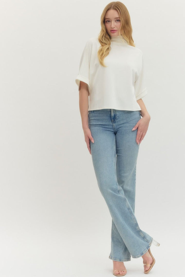 Women's Entro cream scuba knit top with mock neck and dolman sleeves showing full front view