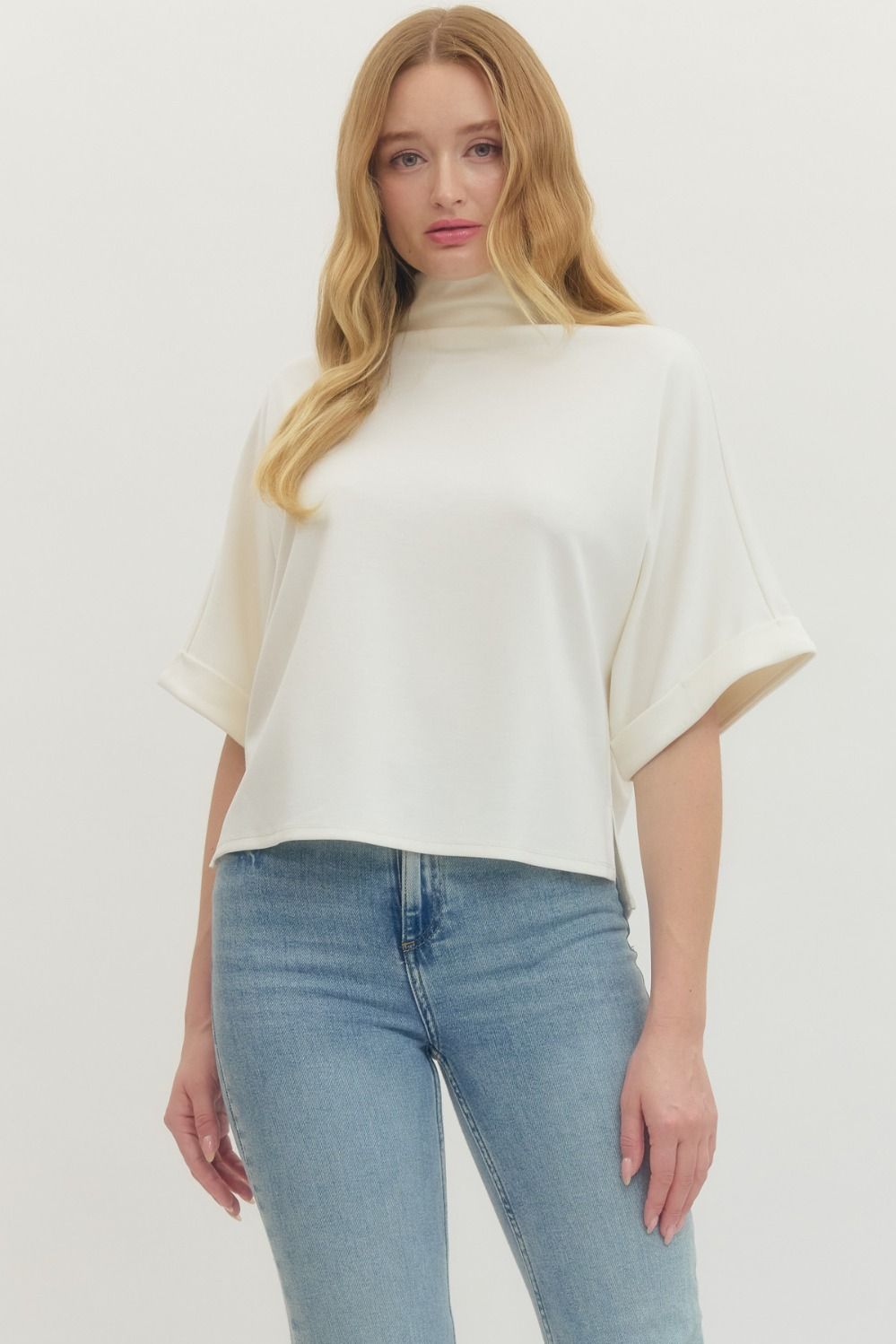 Women's cream scuba knit top with mock neck and dolman sleeves by Entro