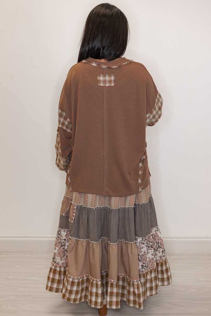 back view of Women's mocha brown knit long sleeve top with plaid detailing 