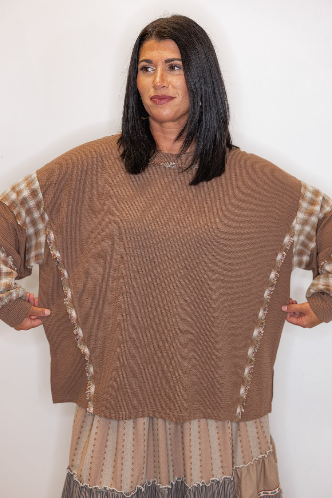 Women's mocha brown knit boho top with plaid trim on bodice and sleeves