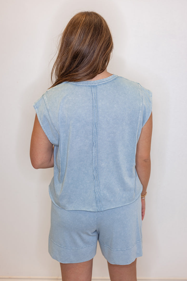 Women's mineral washed utility blue knit sleeveless top by Rae Mode showing back view