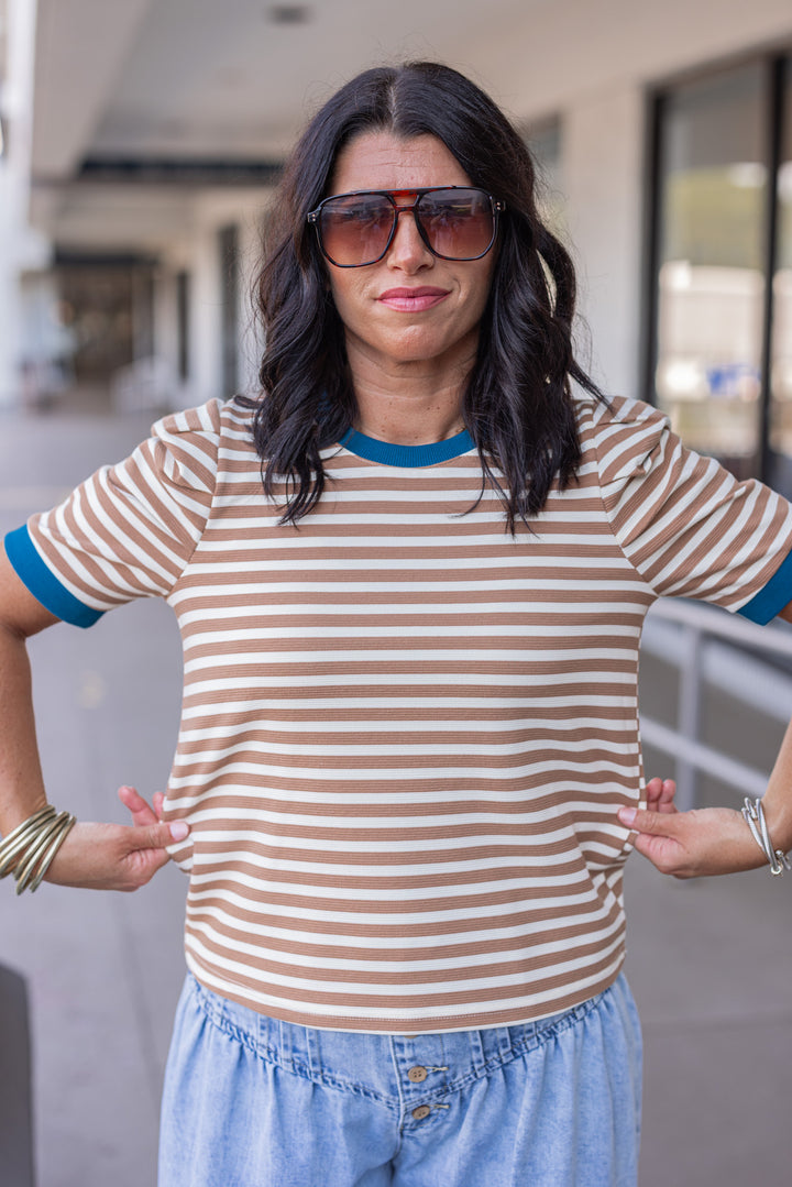 Women's tan striped knit textured top with dark turquoise trim by Entro showing true to size fit