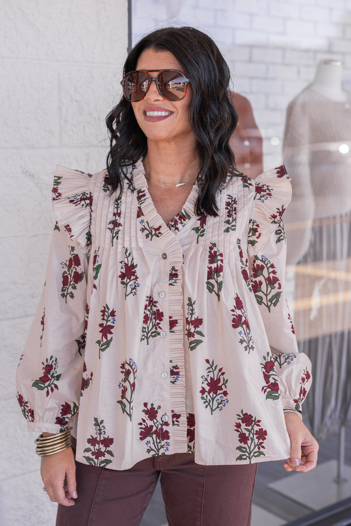 Women's ecru and burgundy floral print babydoll top with pleats and ruffle details by Entro