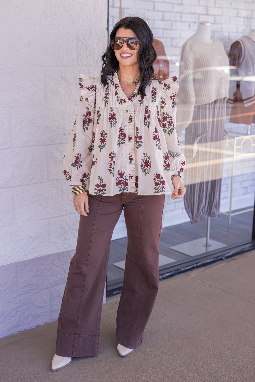 Women's ecru and burgundy floral print babydoll top with pleats and ruffle details by Entro, perfect for the thanksgiving season