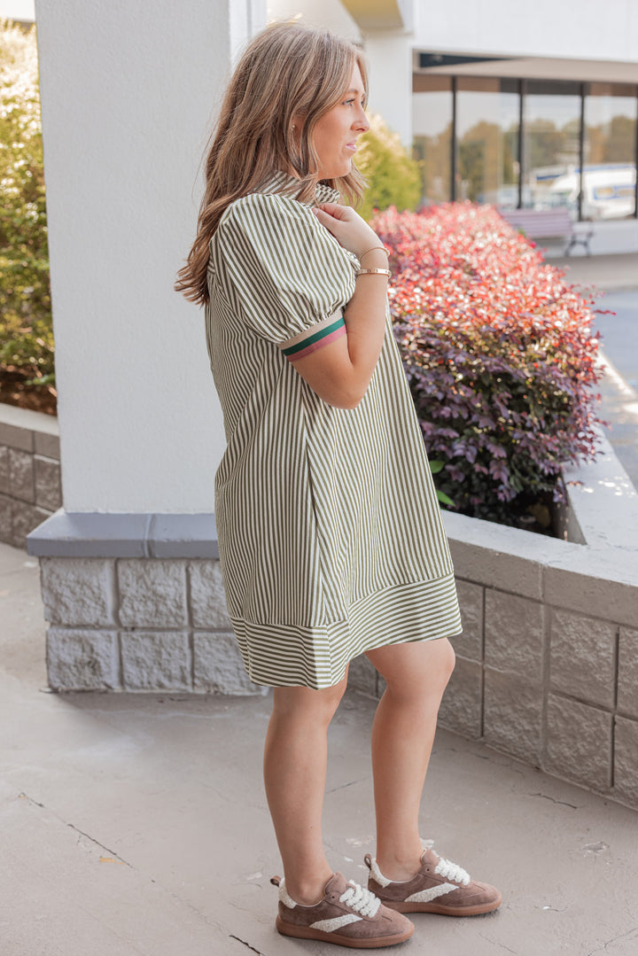 Women's olive and ivory striped dress by Entro showing full side view