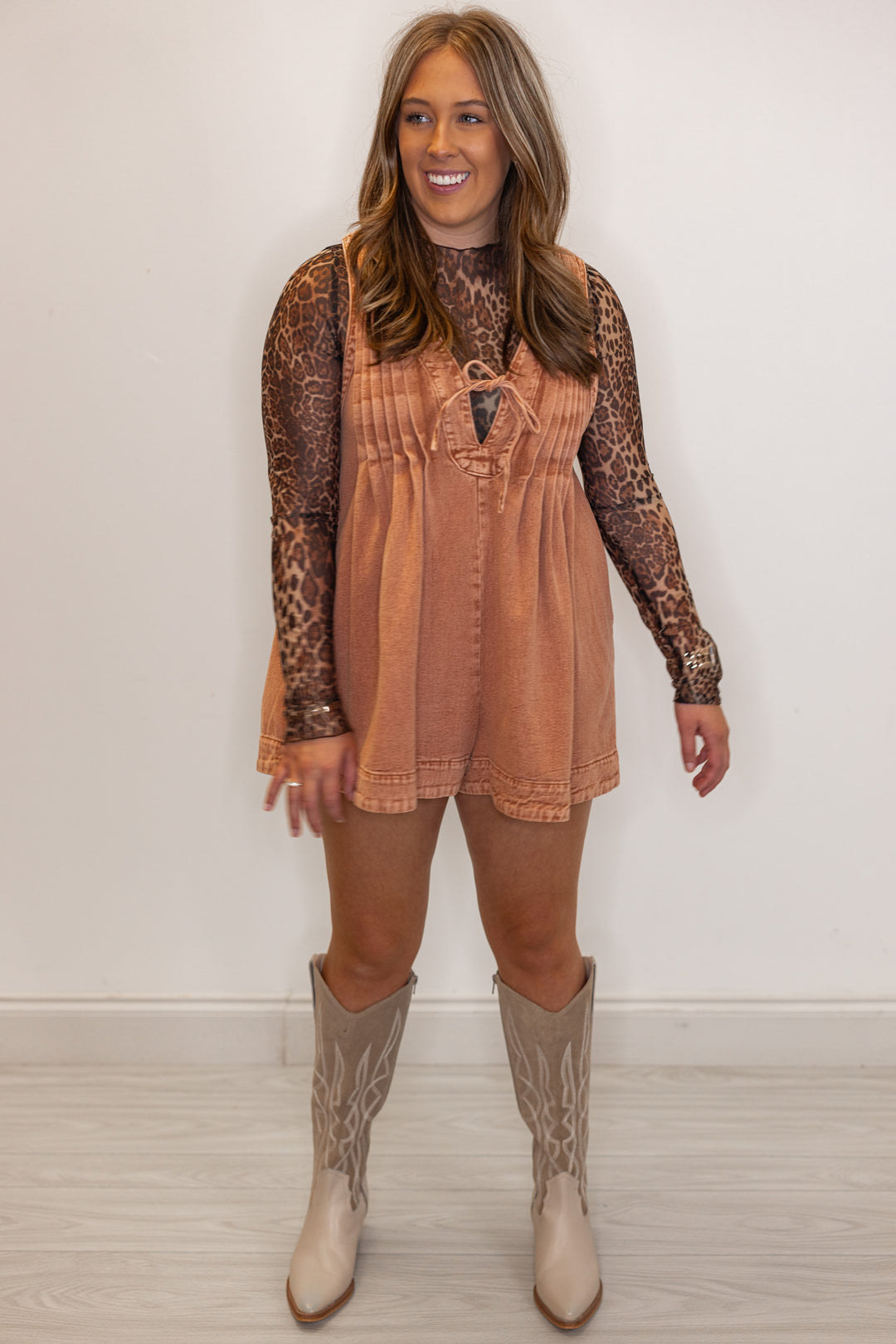 women's fashion rust brown denim tie chest romper paired with ivory western boots