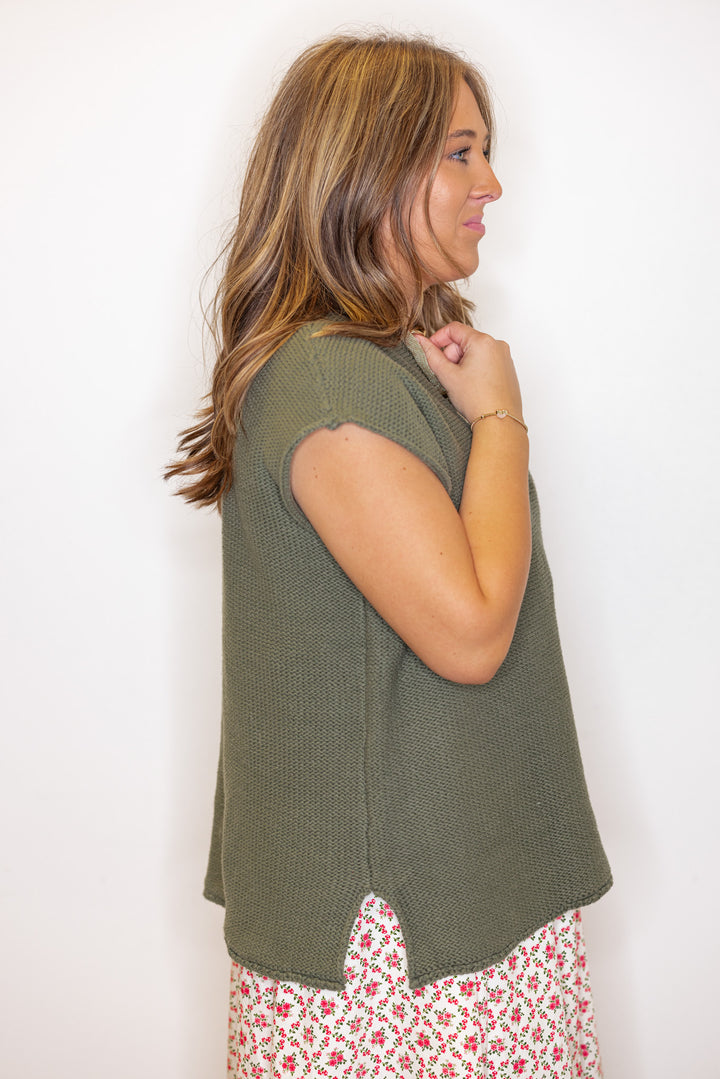 Women's olive green short sleeve sweater knit top by Wishlist showing up close side view