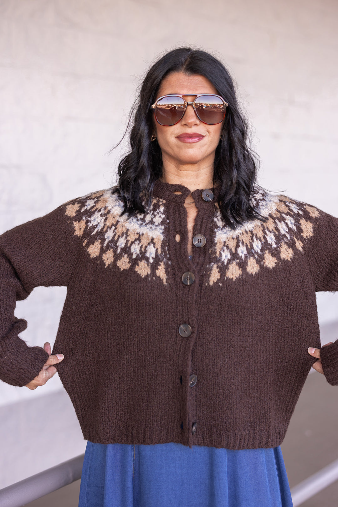 Women's brown button front sweater cardigan with print around the shoulders by Blu Pepper showing true to size fit