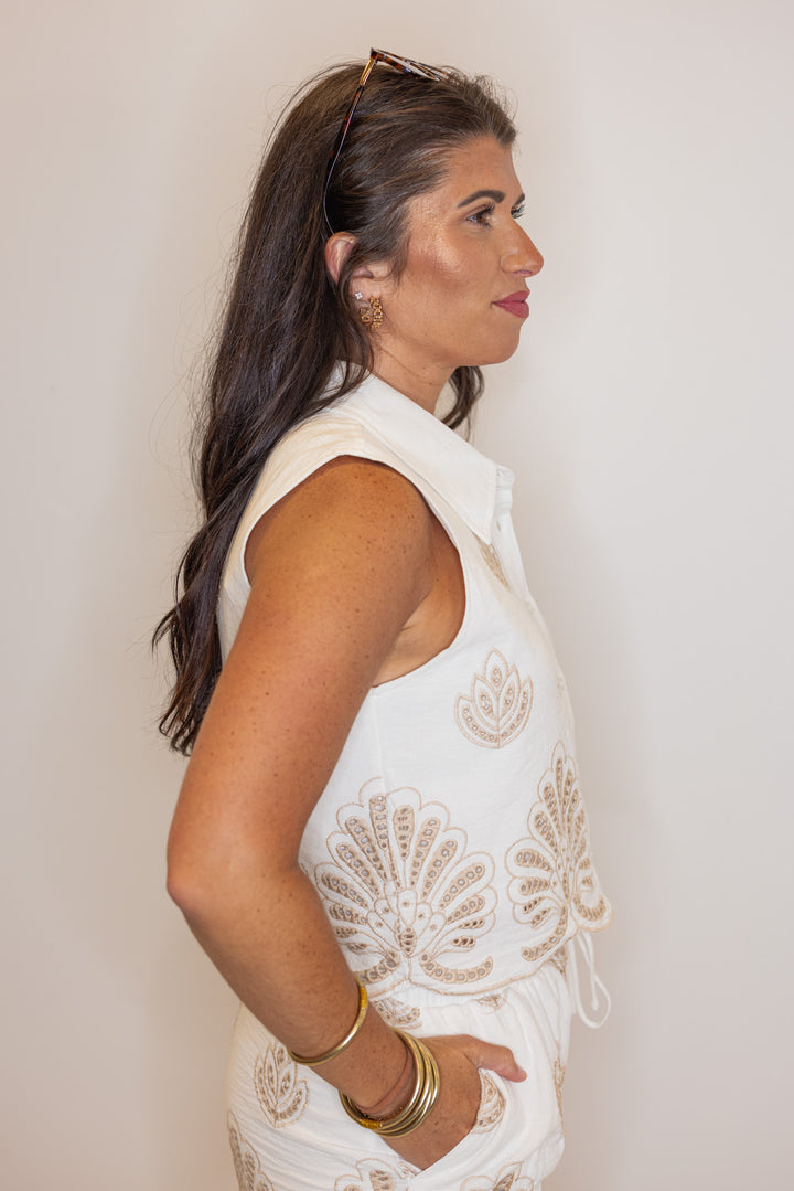 Women's off white shorts and top matching set with taupe embroidered details by Illa Illa showing side view of top