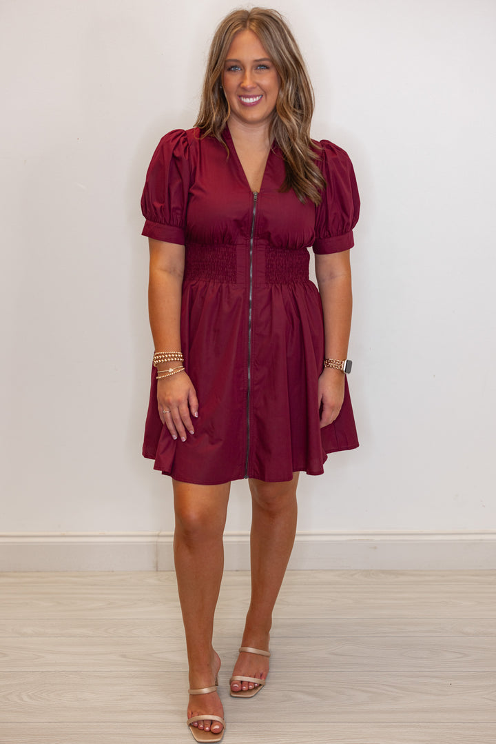 Women's zip front smocked waist burgundy dress by Entro showing full front view