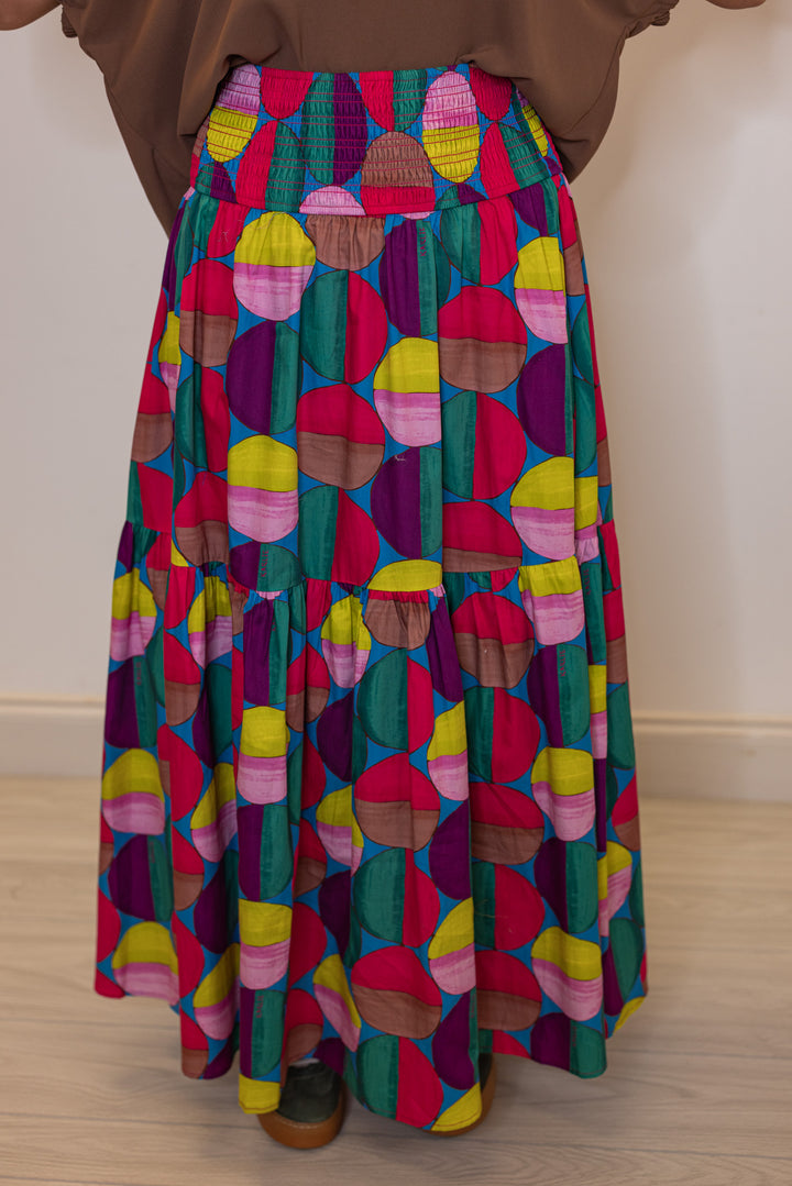 Women's smocked hot pink and multicolor print tiered poplin maxi skirt by Karlie