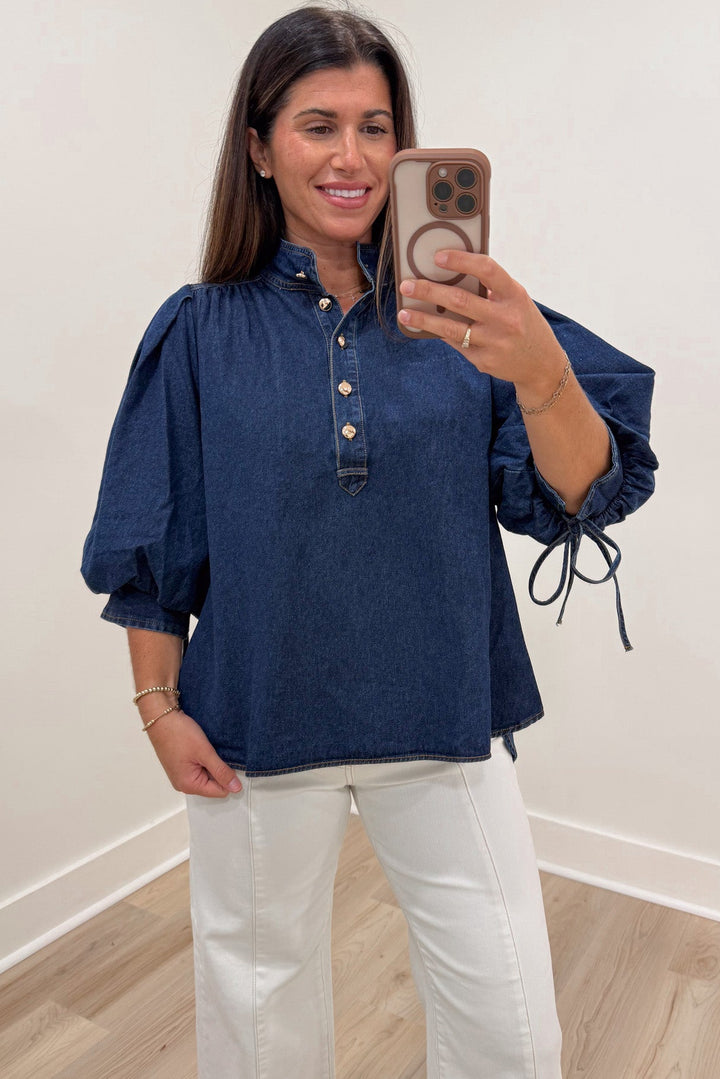 solid dark blue denim 3/4 length puff sleeve mock neckline button front bodice top