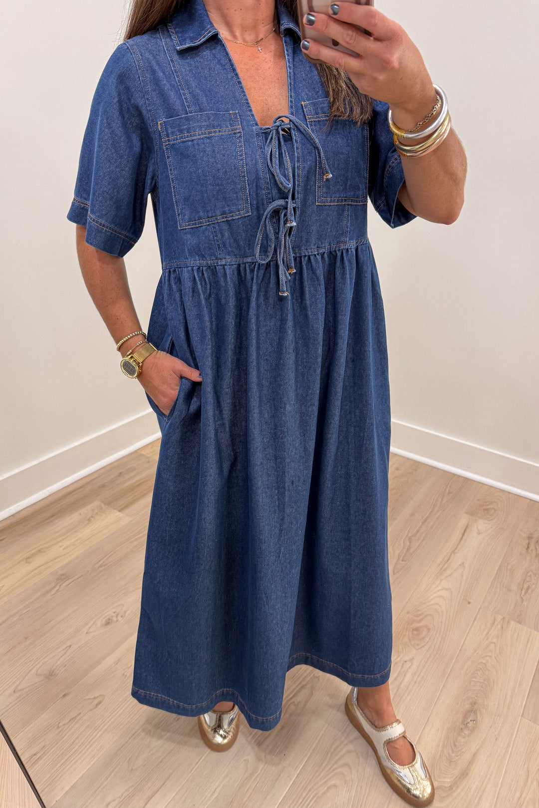 solid dark blue wash denim collared v neckline bow tie bodice short sleeve midi dress