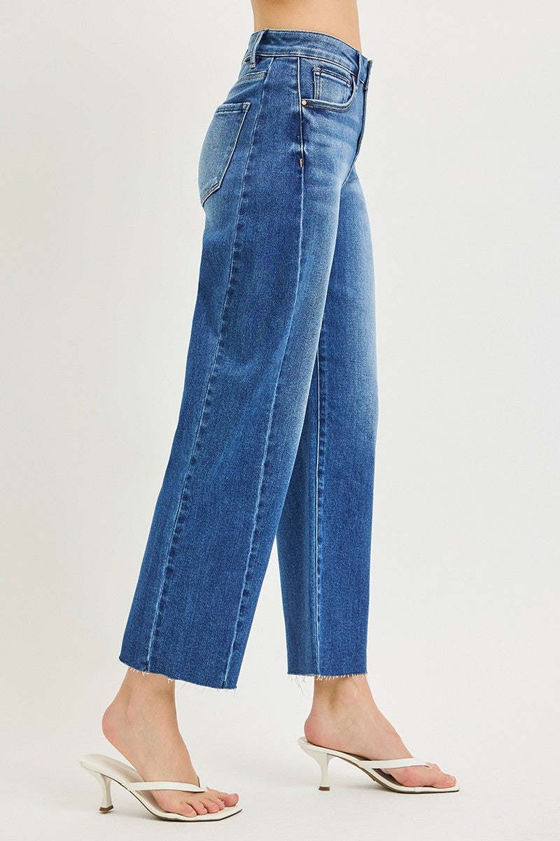 Risen Jeans dark wash blue denim slouchy barrel jeans with raw hem