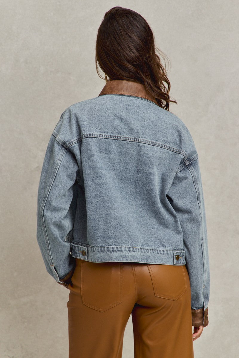 denim jacket with brown leather trim back