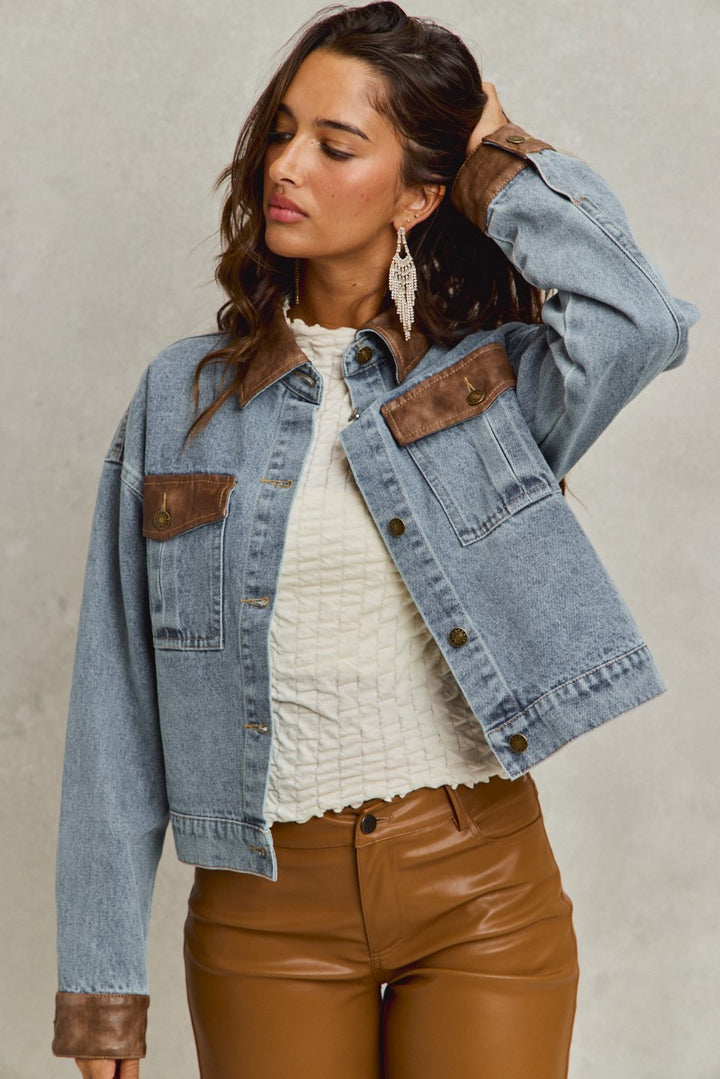denim jacket with brown leather trim side
