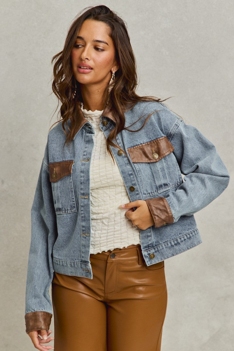denim jacket with brown leather trim pockets