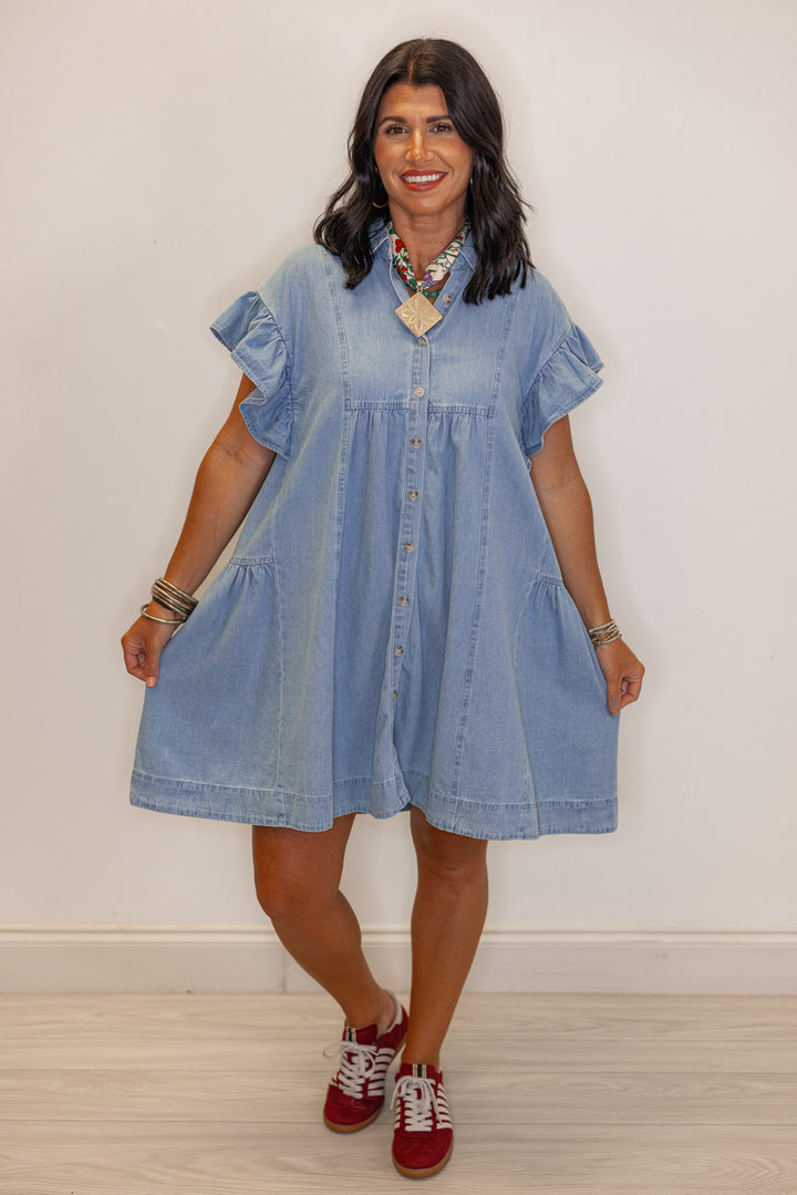 Women's light blue denim button down swing dress by Entro showing button down front closure