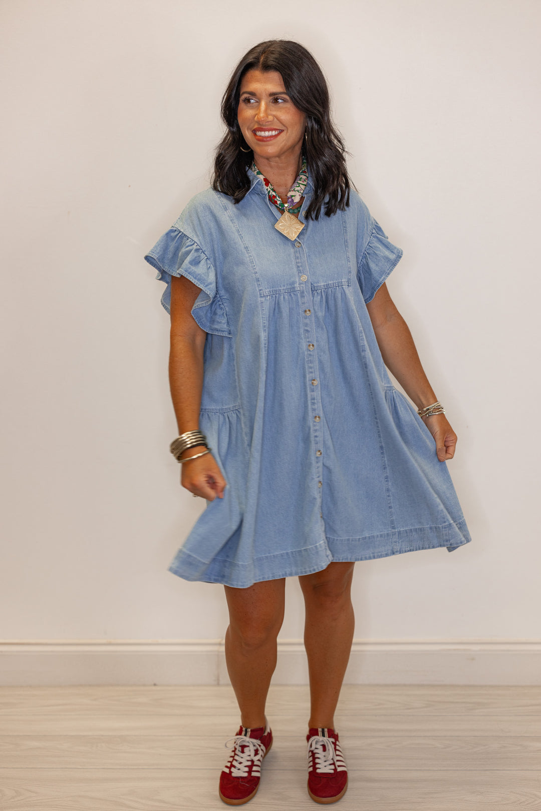 Women's light blue denim button down swing dress by Entro showing relaxed silouhette