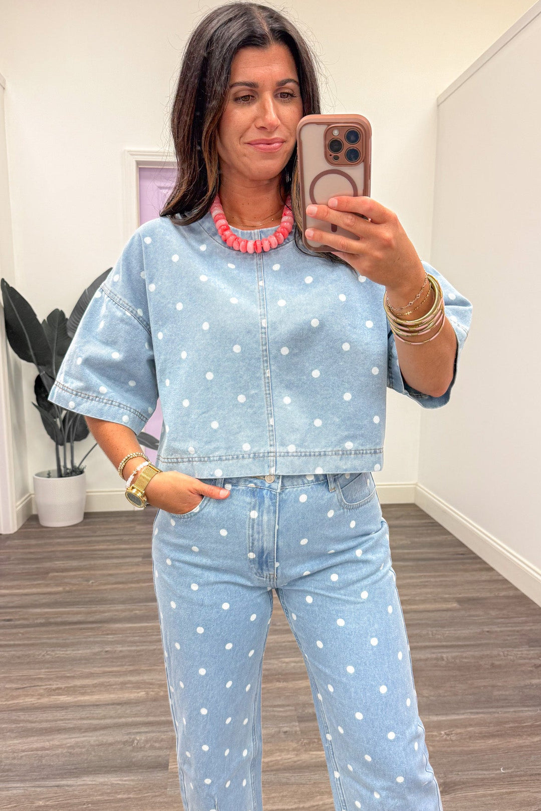 washed blue denim with white polka dot print semi-cropped top