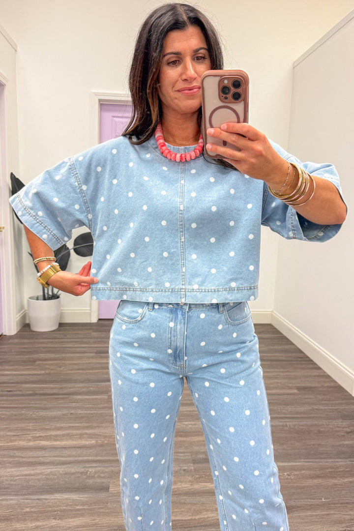 washed blue denim with white polka dot print boxy silhouette semi-cropped top