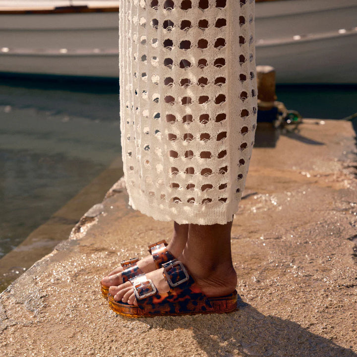 dolce vita julio slide sandals on feet