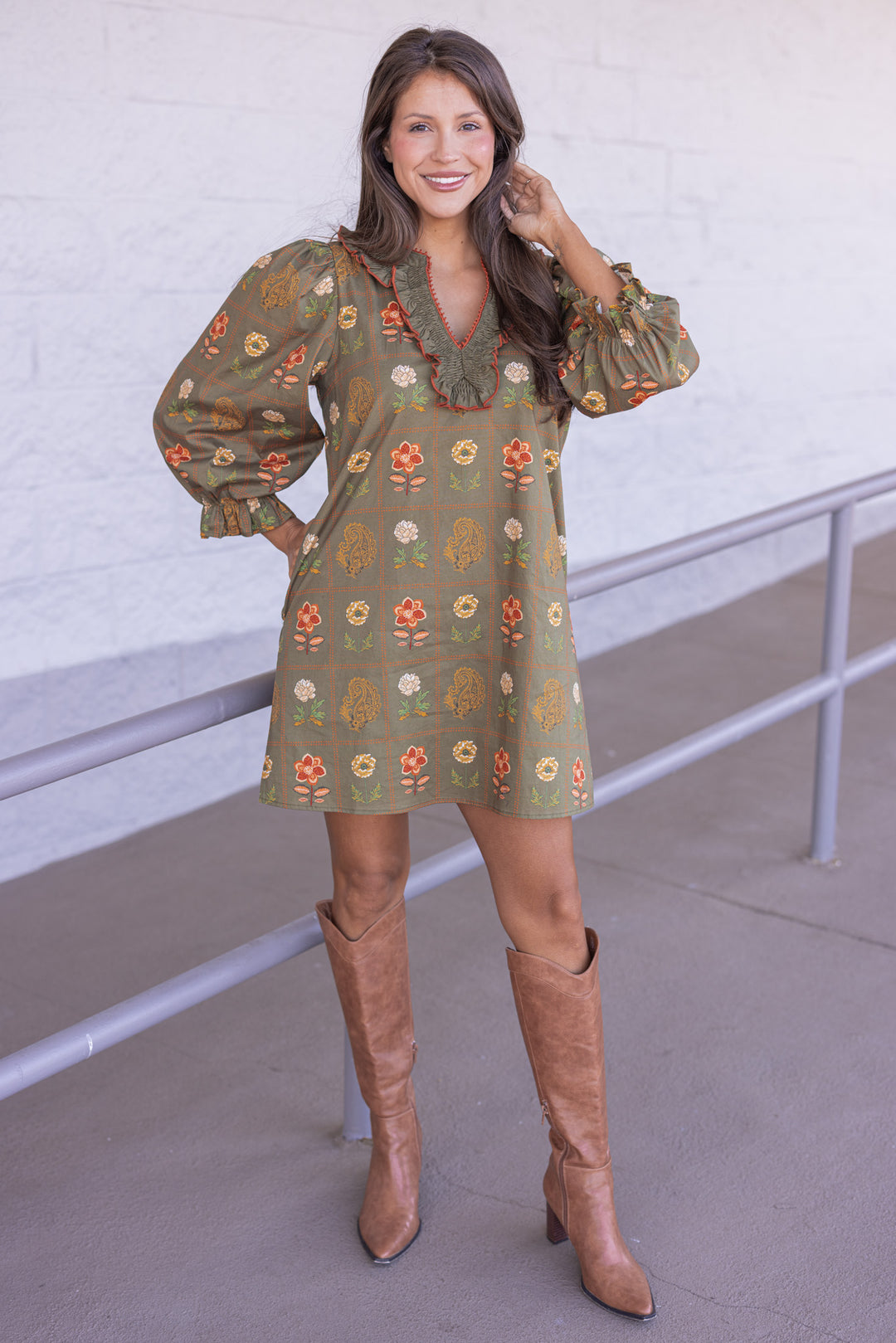 Women's olive dress with floral border print in orange and peach by Entro showing full front view