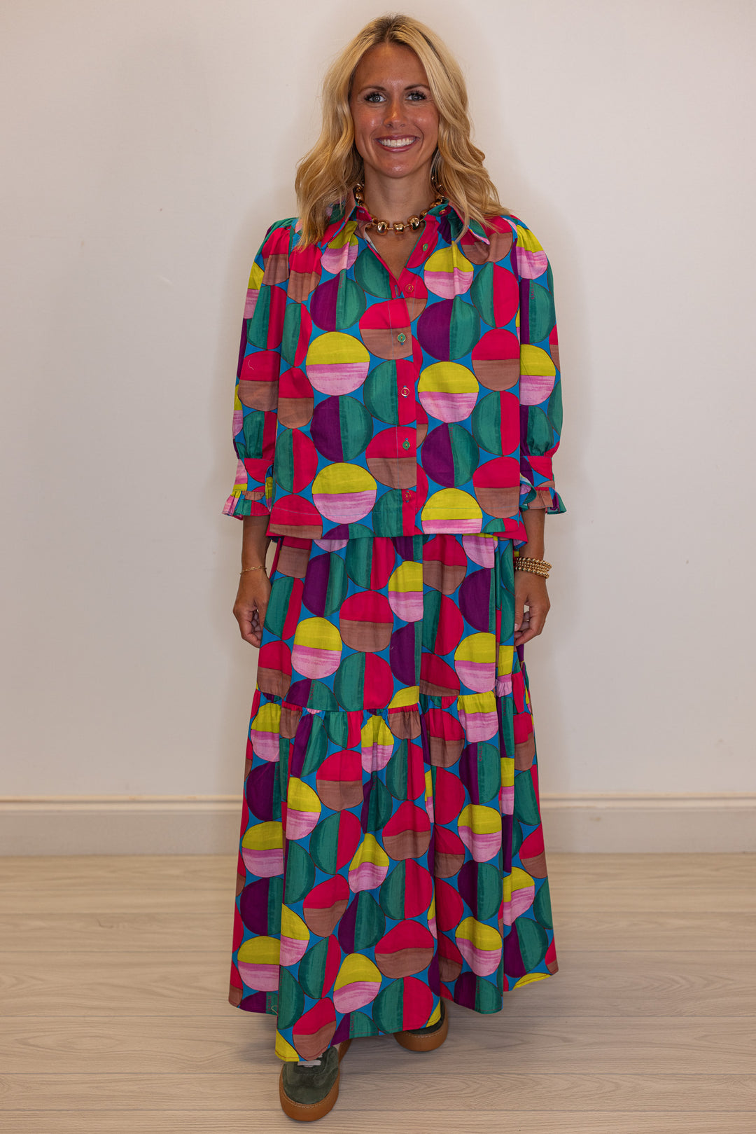 Women's hot pink and multicolor print button front poplin top by Karlie showing full front view