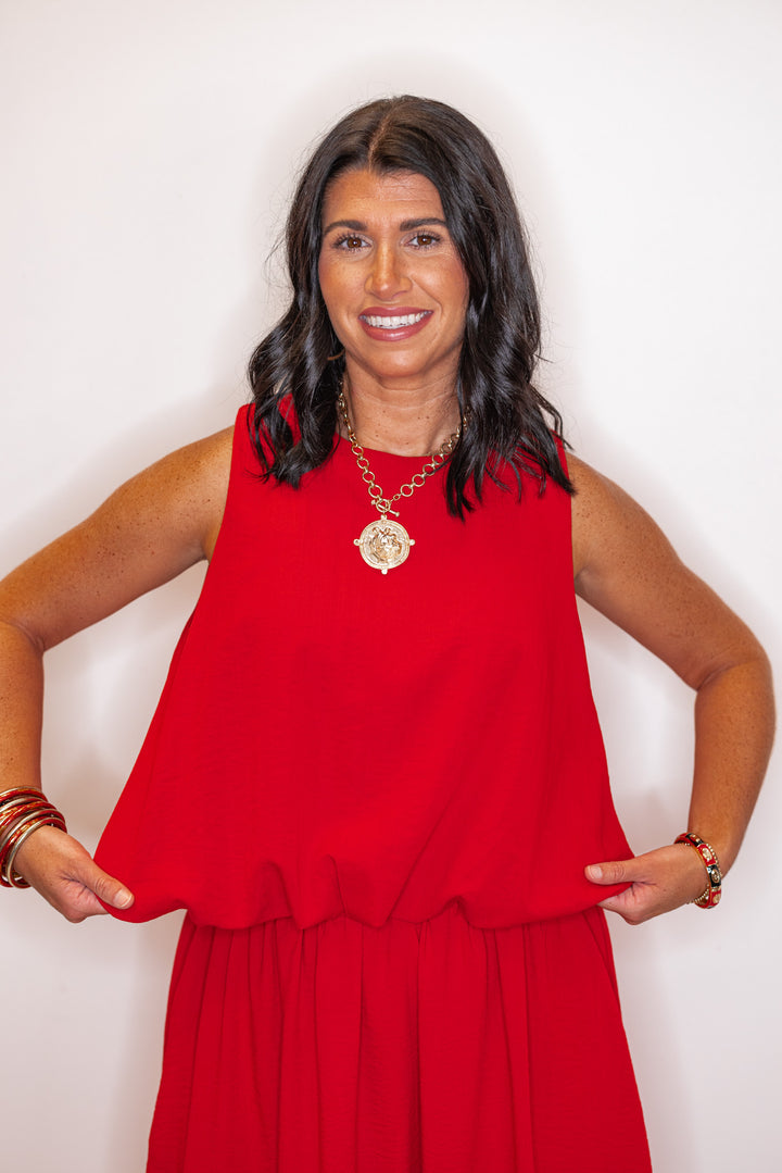 Women's red textured bubble hem sleeveless crop top by Entro showing up close front view