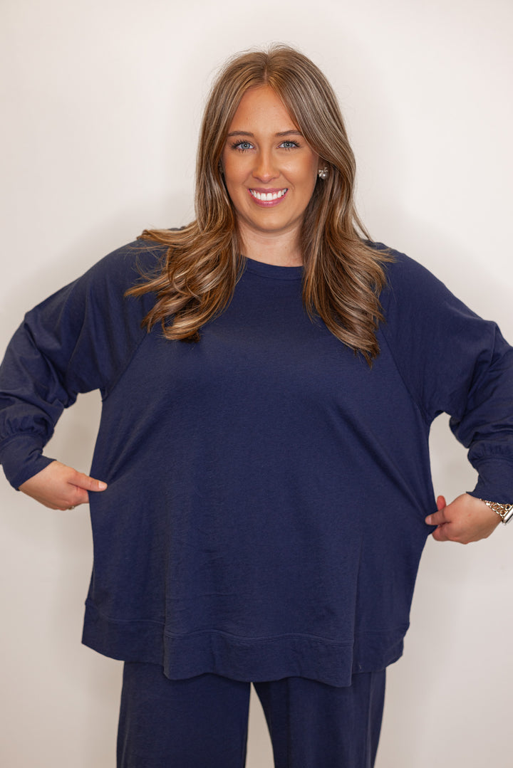 Upclose picture of Women's navy blue athleisure long sleeve t shirt 