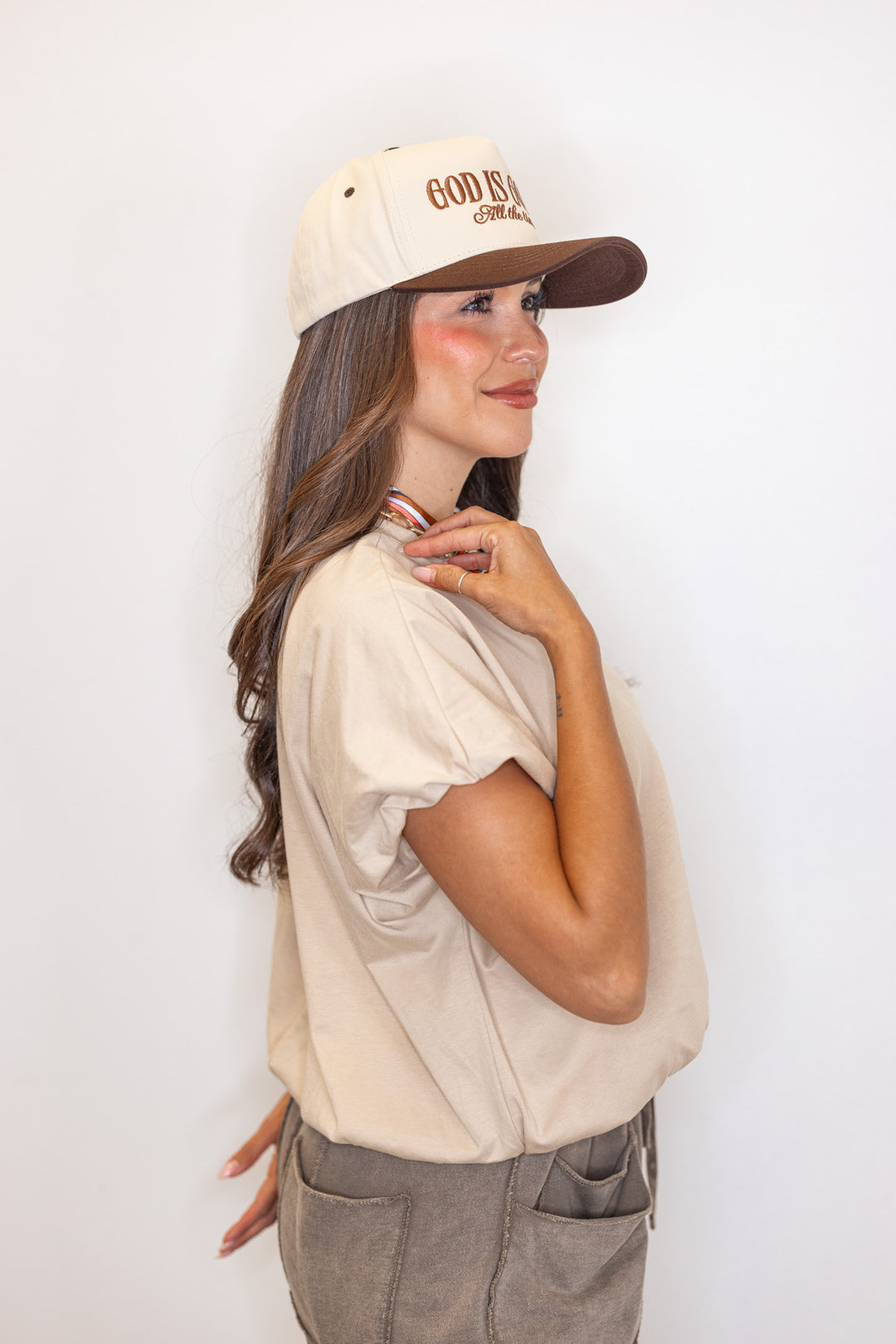 Women's sand knit semi-cropped top with bubble hem by Wishlist showing up close side view