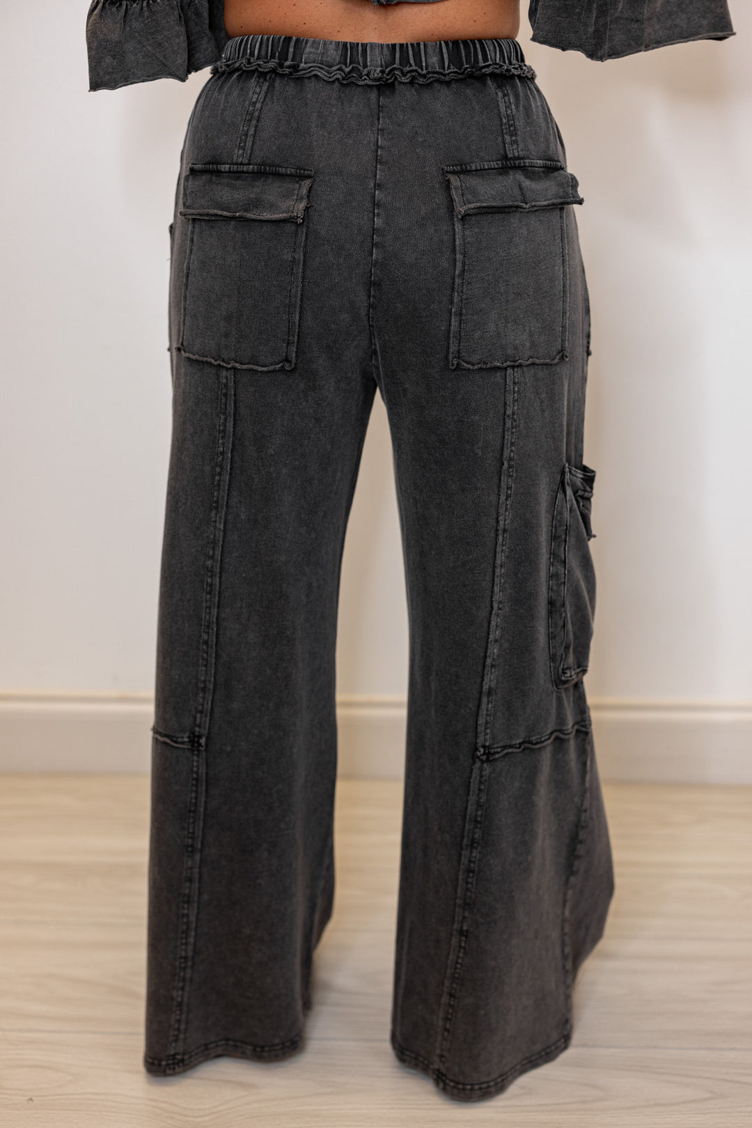 Women's mineral washed black terry knit exaggerated wide leg pants by Easel showing up close back view