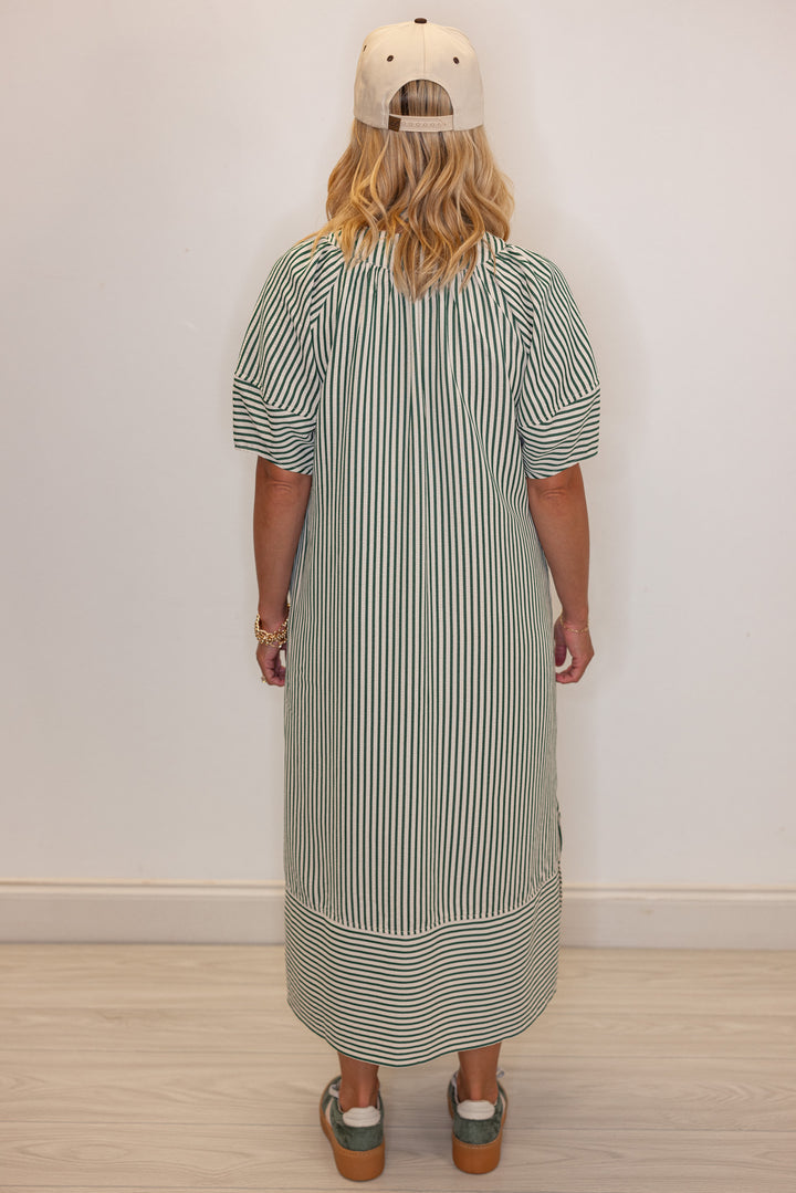 Women's hunter green and ivory striped midi dress by Entro showing back view