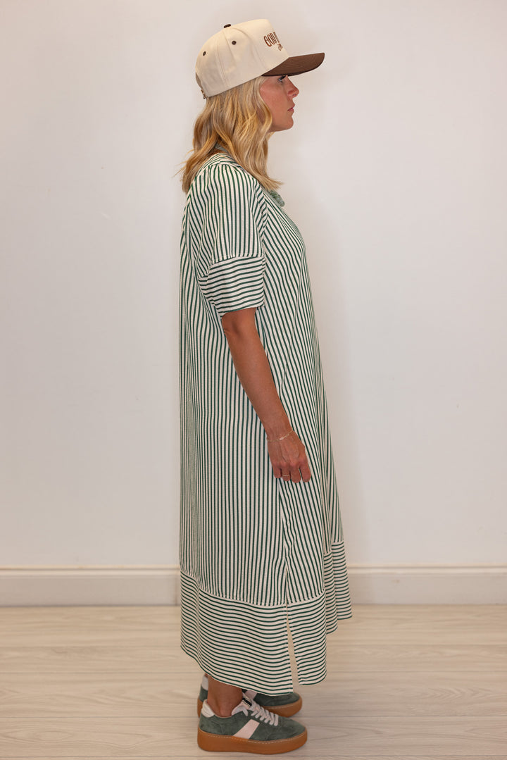 Women's hunter green and ivory striped midi dress by Entro showing side view