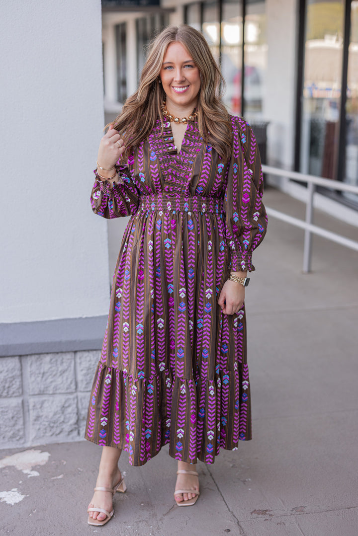 Women's brown ruffle trimmed midi dress with pink multicolor petal print by Umgee showing full front view
