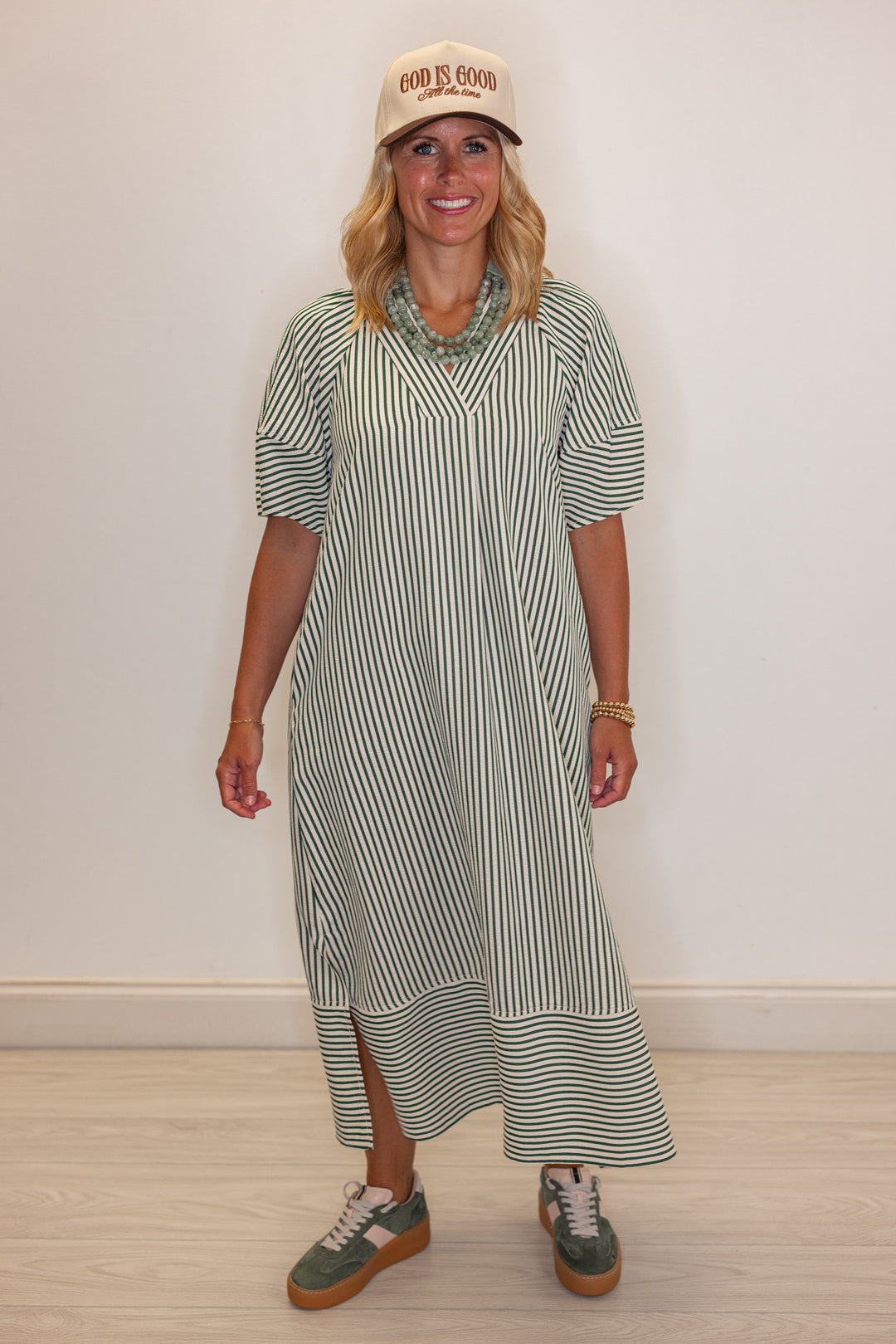 Trendy women's hunter green and ivory striped midi dress by Entro