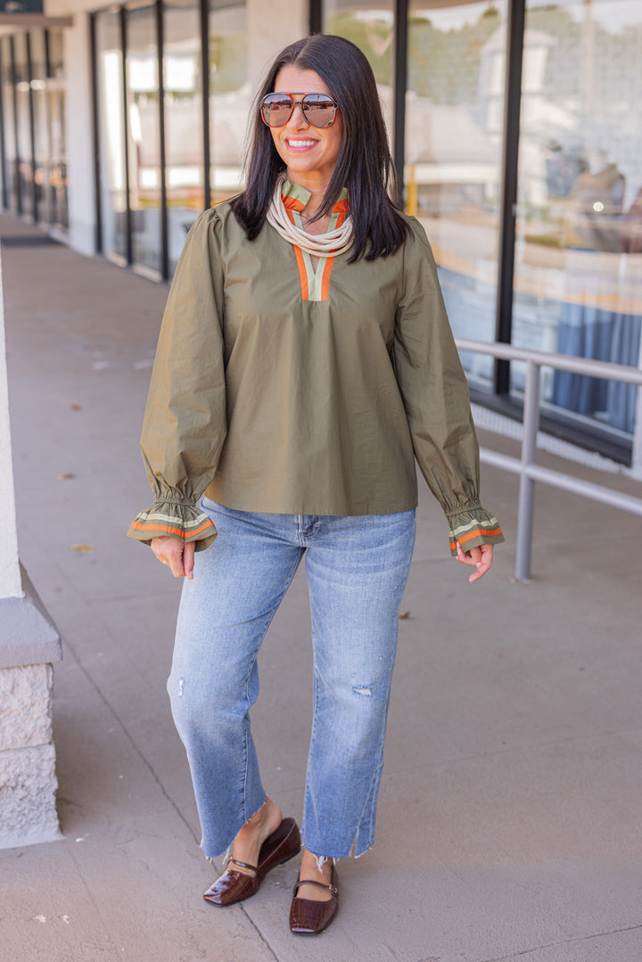 Women's olive poplin top with orange and light olive trim by Jodifl, perfect for teachers