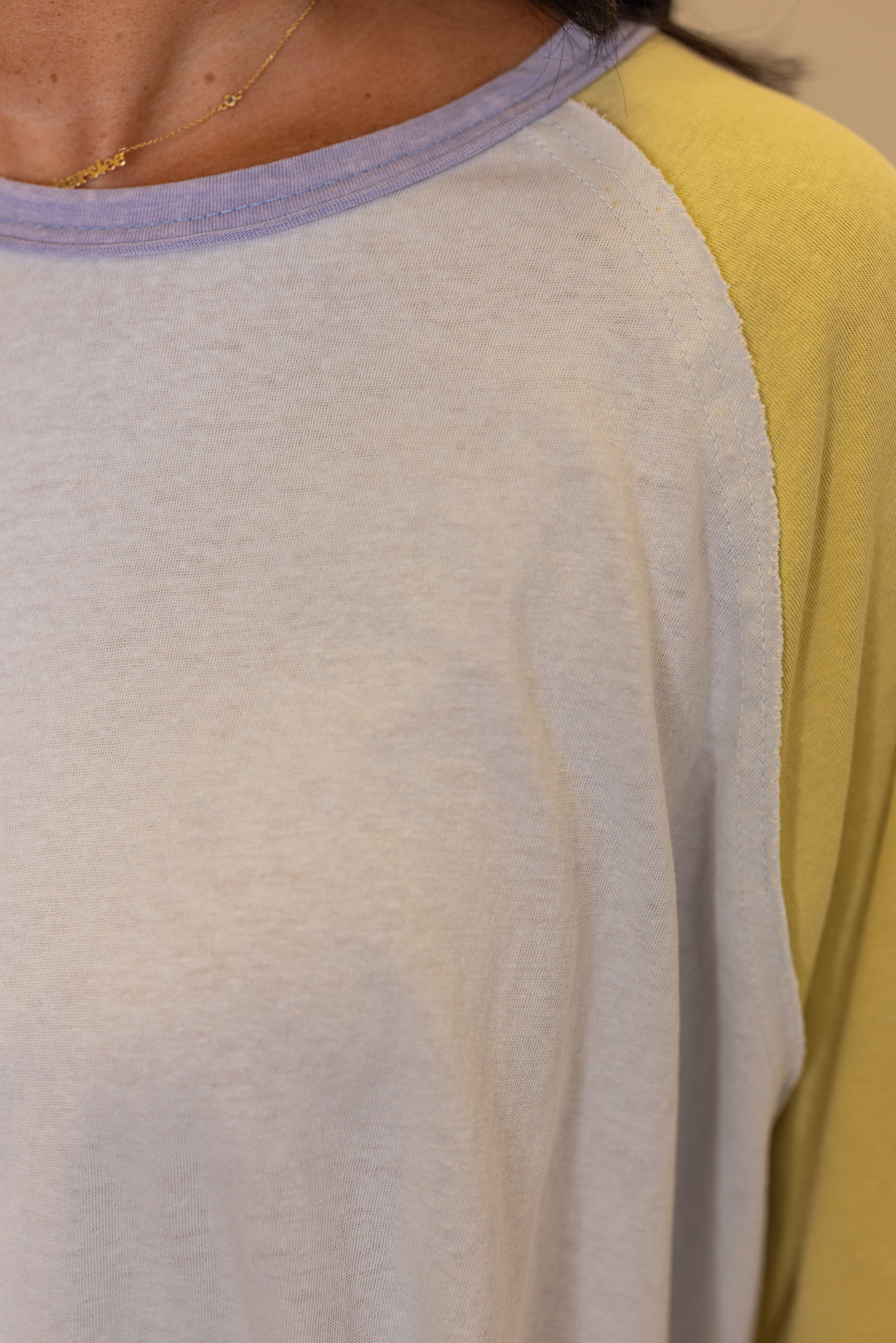 Women's light blue and dijon yellow colorblock top by Easel showing knit fabric