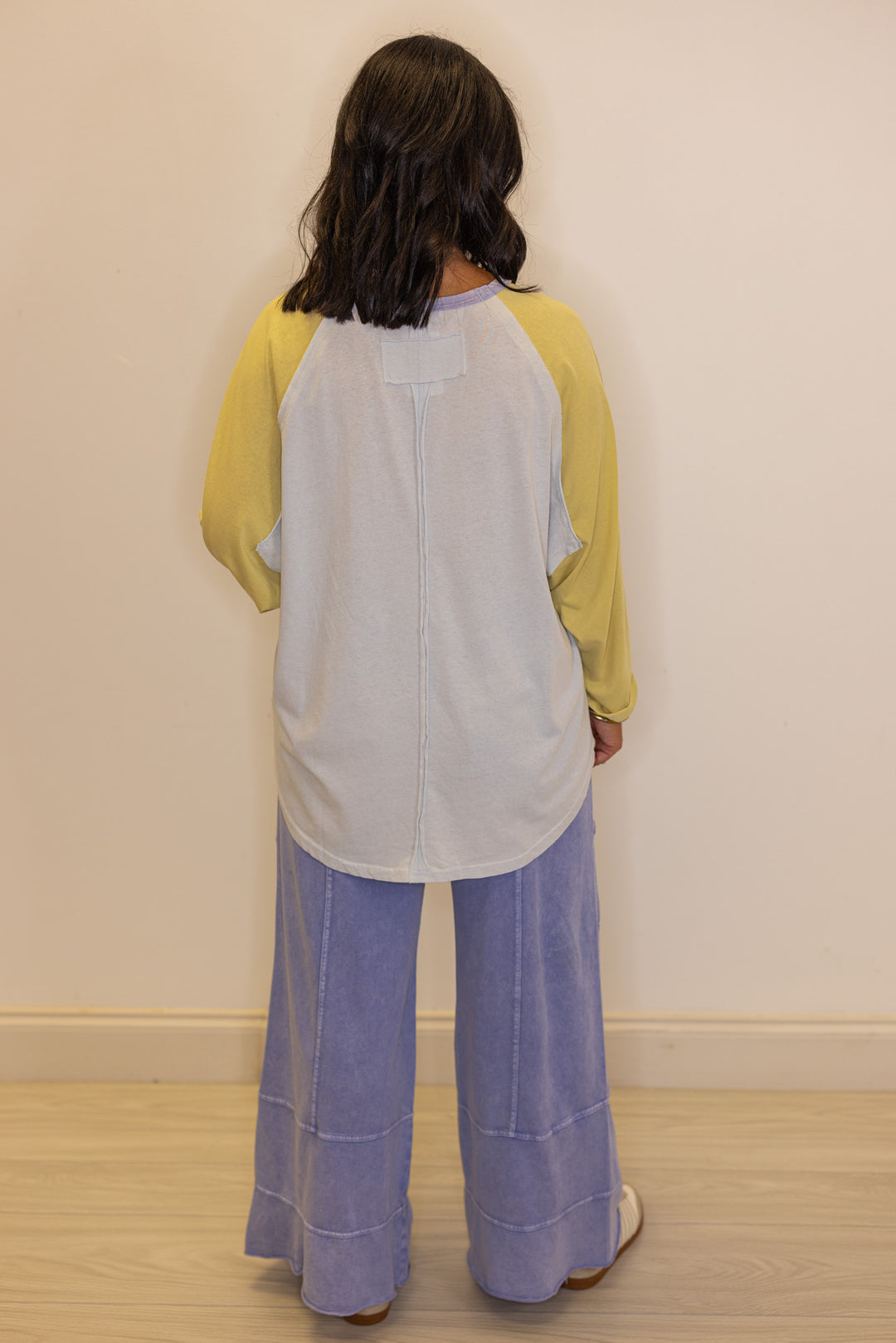 Women's light blue and dijon yellow colorblock knit top by Easel showing full back view