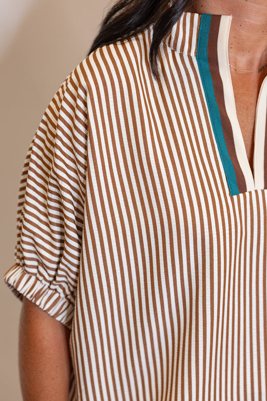 Women's caramel and ivory striped dolman top by Entro showing striped detail