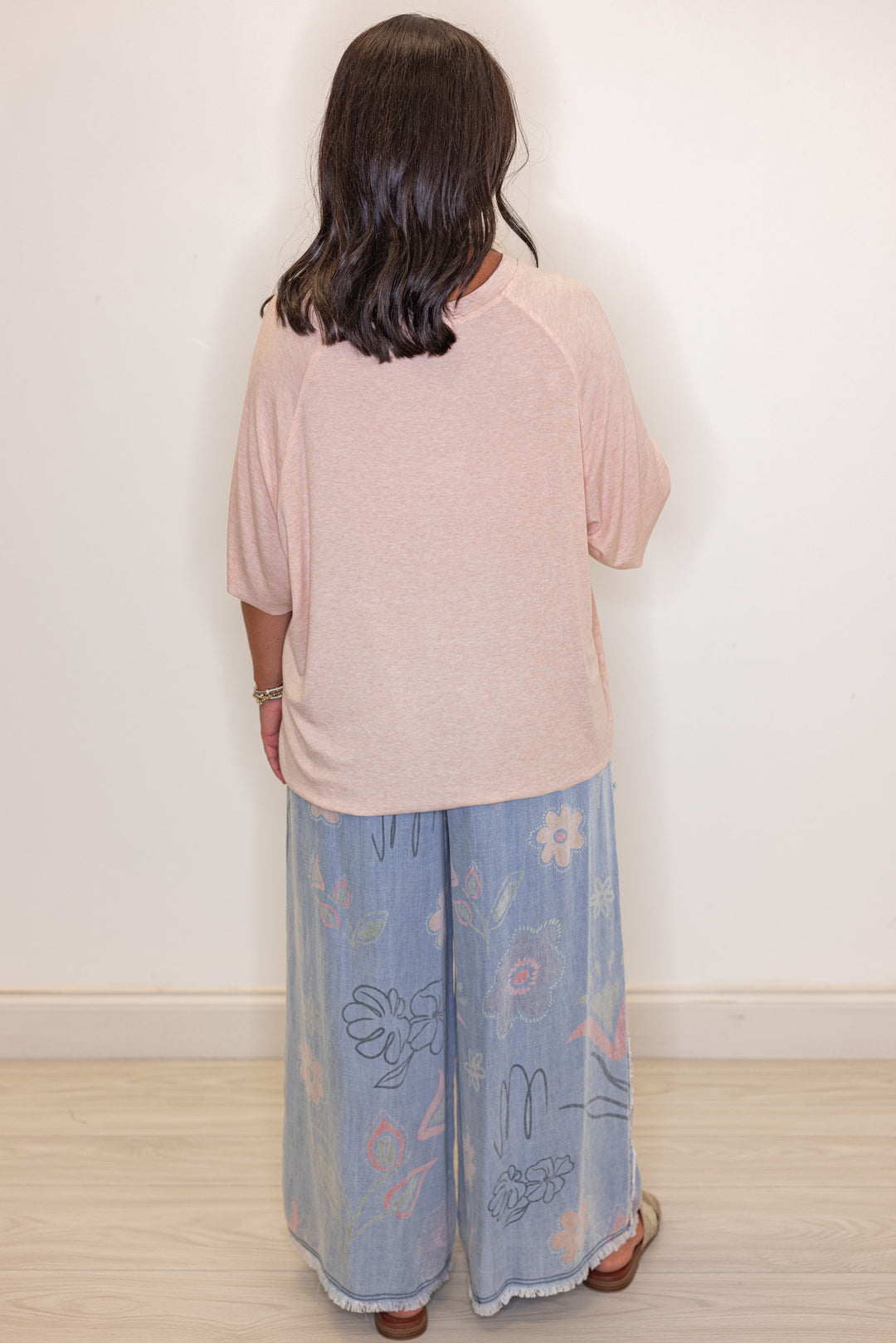 Women's baby pink stone washed jersey knit top by POL showing full back view