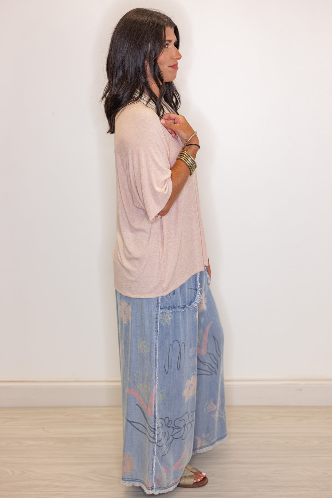 Women's baby pink stone washed jersey knit top by POL showing full side view