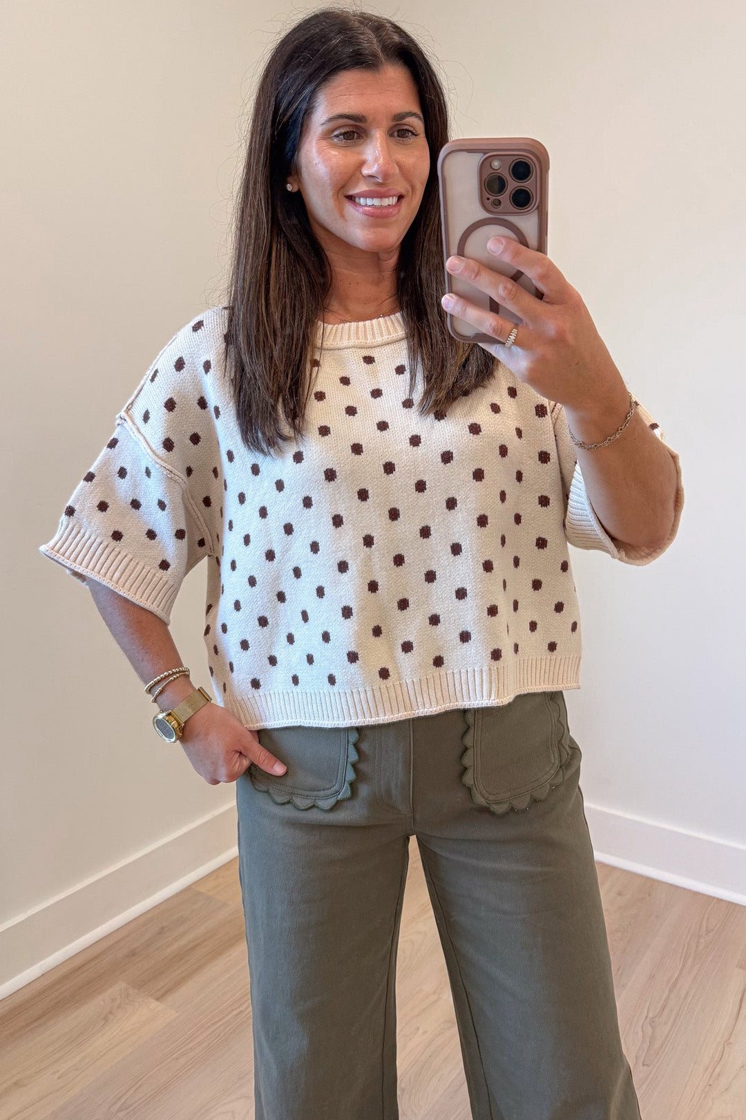 ecru with brown polka dot print half-length sleeve semi-cropped knit top with reverse seam details
