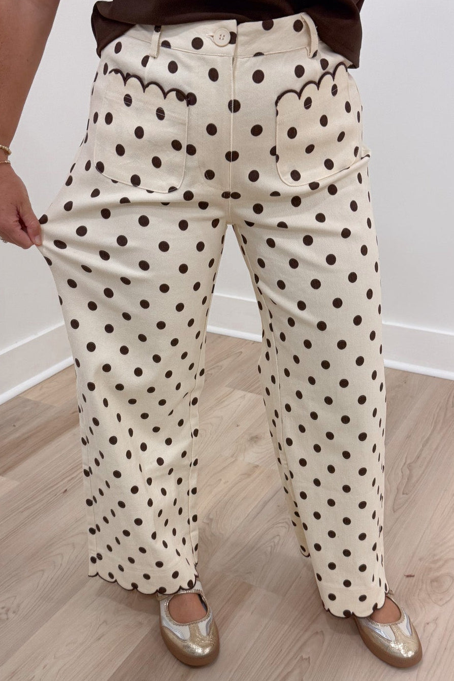 ecru with brown polka dot print high waisted wide leg twill denim pants with button zipper closure