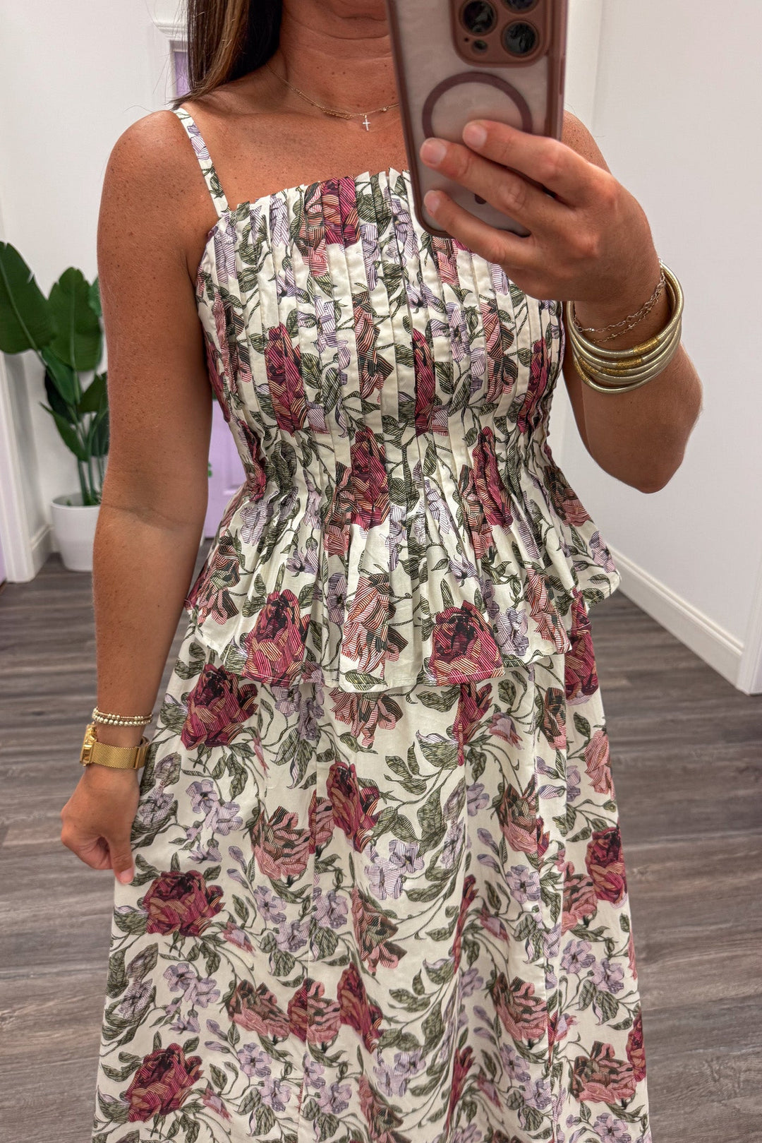 ecru with burgundy and green floral print sleeveless pleated peplum style midi dress