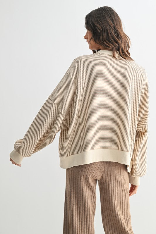 Women's ecru and caramel striped knit long sleeve pullover top by Wishlist showing back view