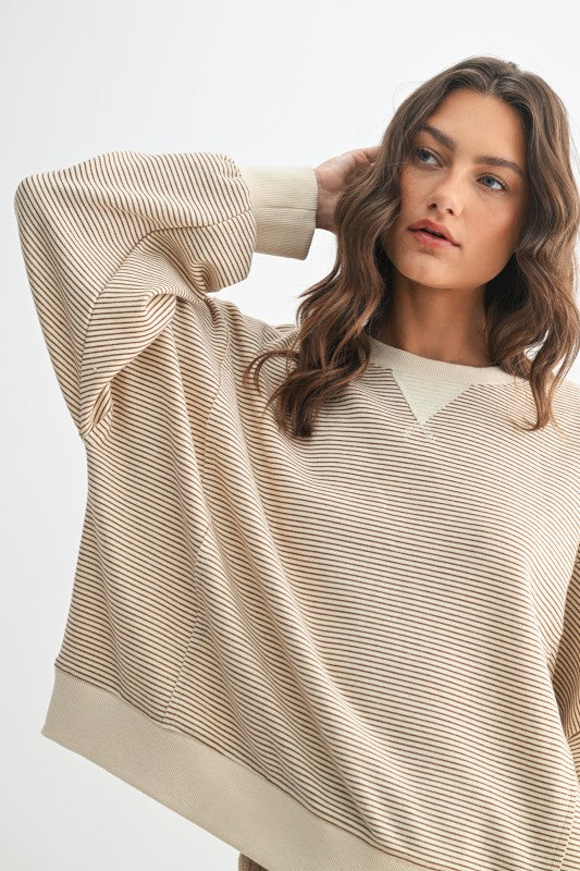 Women's ecru and caramel striped knit long sleeve pullover top by Wishlist