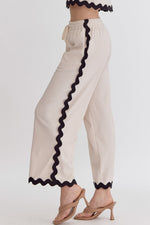 Entro Ecru ribbed knit wide leg pants with black scalloped piping ric rac trim