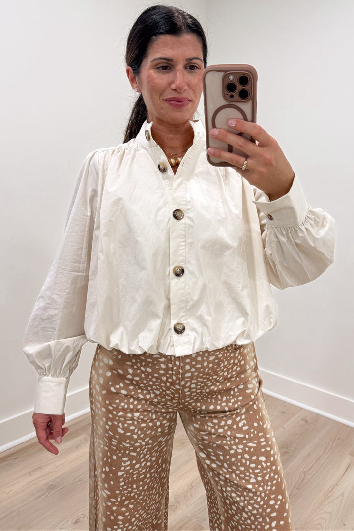 solid ecru long sleeve ruched button front bubble hem cotton poplin top